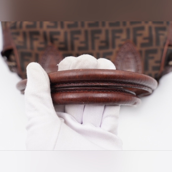 fendi tobacco zucca Medium Magic Bag Noticeable creasing to leather strap near adjustable buckle closure Fendi Zucca FF Boston Vintage